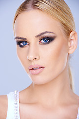 Image showing Beautiful blue-eyed woman wearing makeup