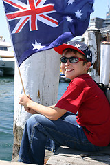 Image showing Boy on harbourside pier