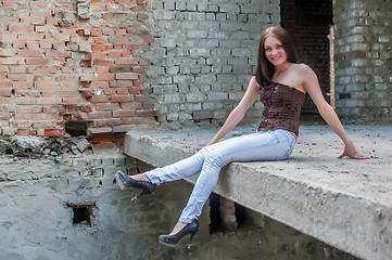 Image showing Grunge portrait of a woman in urban ruins