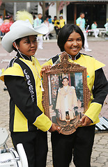 Image showing Thai students holding a photograph of the King of Thailand durin