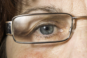 Image showing Close up old women eye and glasses