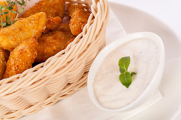 Image showing Crumbed chicken nuggets in a basket