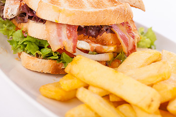 Image showing Club sandwich with potato French fries