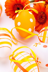 Image showing Colourful yellow decorated Easter eggs