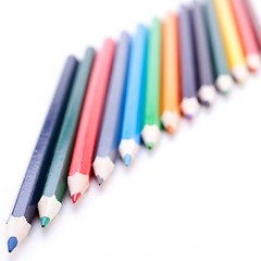 Image showing Bunch of colourful pencil crayons on white