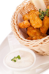 Image showing Crumbed chicken nuggets in a basket