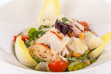 Image showing tasty fresh caesar salad with grilled chicken and parmesan 