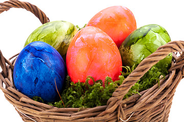 Image showing Basket of brightly coloured Easter Eggs