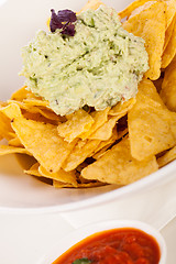 Image showing Crisp corn nachos with guacamole sauce