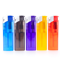 Image showing Vividly coloured plastic lighters