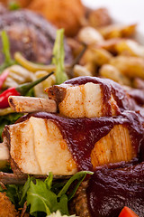 Image showing Platter of mixed meats, salad and French fries