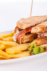 Image showing Club sandwich with potato French fries