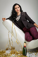 Image showing Seductive brunette holding a glass of champagne