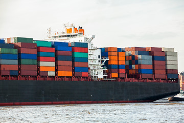 Image showing Fully laden container ship in port