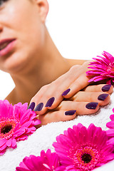 Image showing Woman with beautiful manicured purple nails