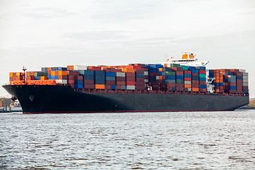 Image showing Fully laden container ship in port