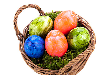 Image showing Basket of brightly coloured Easter Eggs