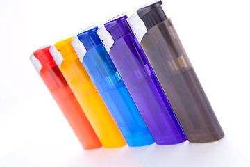 Image showing Vividly coloured plastic lighters