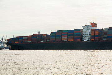 Image showing Fully laden container ship in port