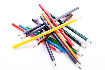 Image showing Bunch of colourful pencil crayons on white