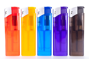 Image showing Vividly coloured plastic lighters