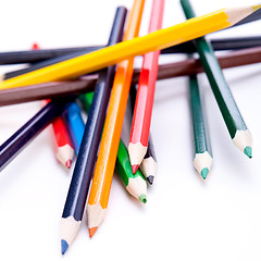 Image showing Bunch of colourful pencil crayons on white