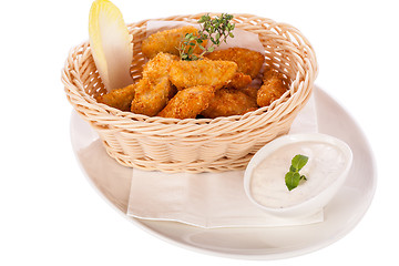 Image showing Crumbed chicken nuggets in a basket