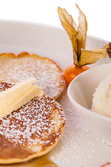 Image showing tasty sweet pancakes with vanilla icecream and topping