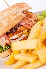 Image showing Club sandwich with potato French fries