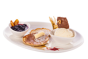 Image showing tasty sweet pancakes with vanilla icecream and topping