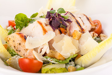 Image showing tasty fresh caesar salad with grilled chicken and parmesan 