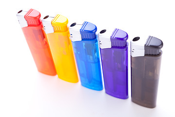 Image showing Vividly coloured plastic lighters