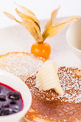 Image showing tasty sweet pancakes with vanilla icecream and topping