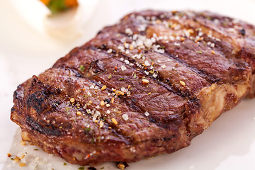 Image showing Grilled beef steak with seasoning