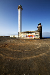 Image showing lighthouse and rock in the blue sky teguise 