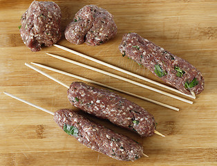 Image showing Making kofta skewers high angle