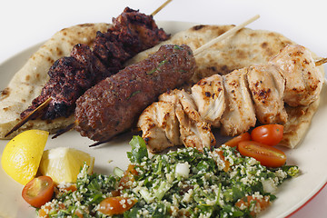 Image showing Arab style barbecue meal with tabouleh