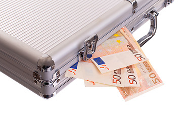 Image showing Metal briefcase full of cash