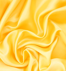 Image showing Smooth elegant golden silk as background 