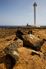 Image showing lighthouse and rock in the blue sky   anzarote spain