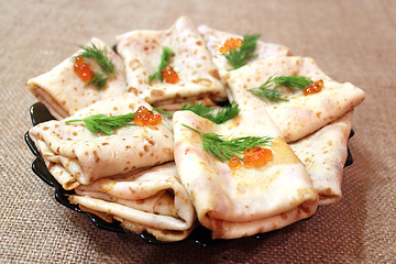 Image showing pancakes with red caviar and fennel