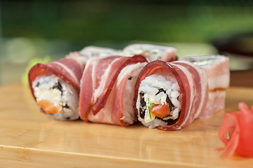 Image showing Sushi roll with bacon