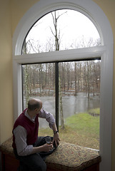 Image showing looking at flooded backyard