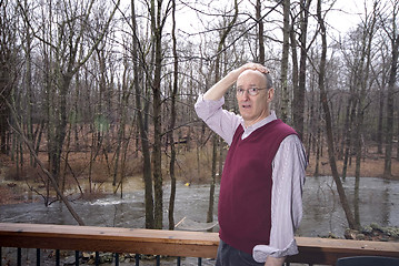 Image showing looking at flooded backyard