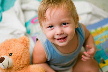 Image showing boy with bear