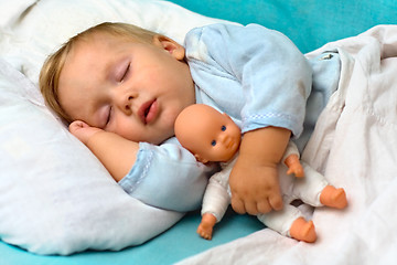 Image showing boy sleeping in a bed