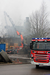 Image showing Extinguishing Smoldering Industrial Fire