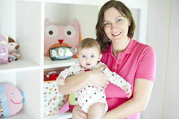 Image showing Mother and baby in playroom