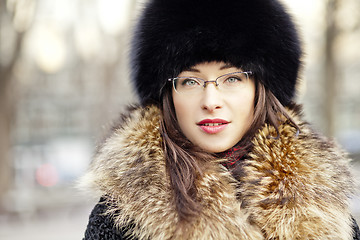 Image showing Woman wearing fur hat and glasses