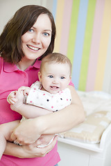 Image showing Happy mother and child in nursery